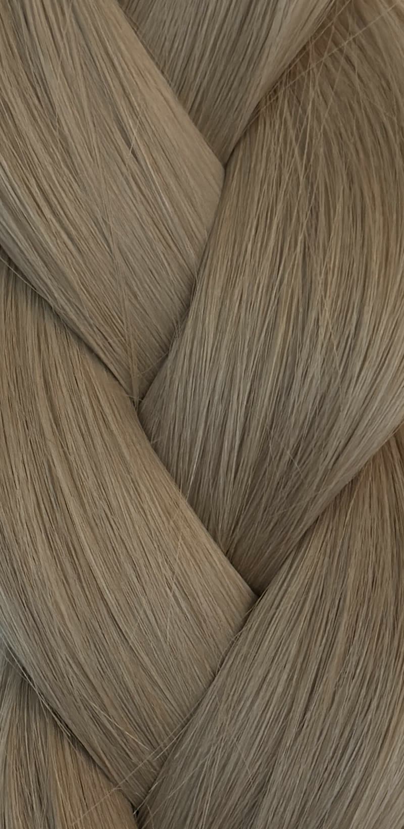 Leggera weft hair, light blonde, plaited.